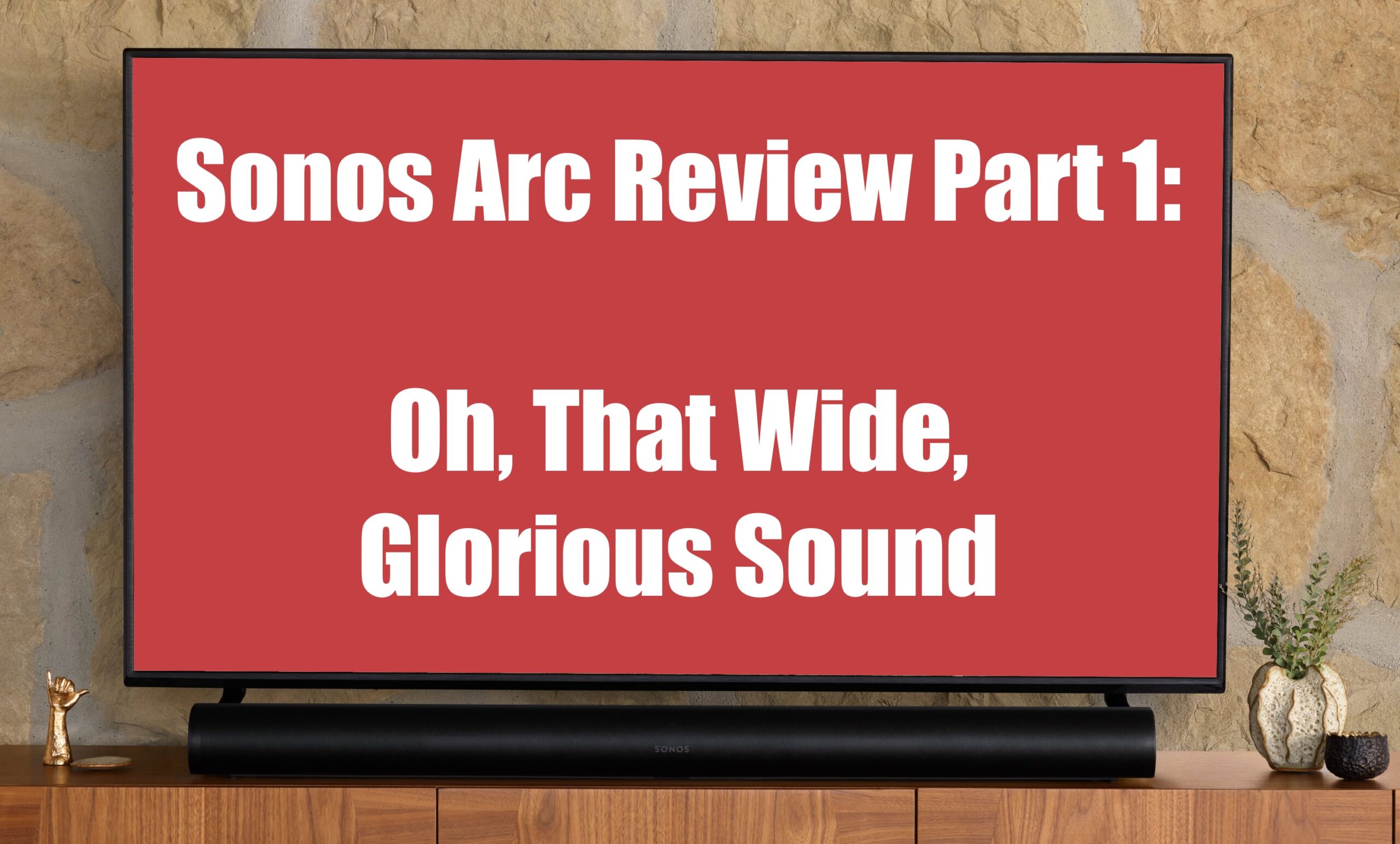 Sonos Arc below TV with Text: Sonos Arc Review Part 1 Oh That Wide Glorious Sound