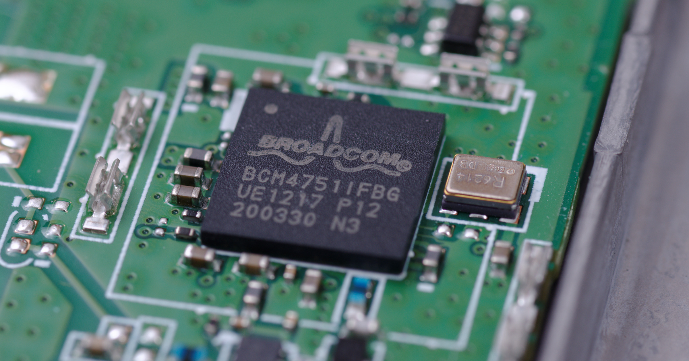 Chip marked Broadcom on a circuit board